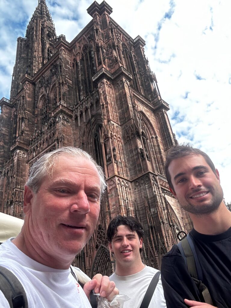 Cathedral and people smiling 